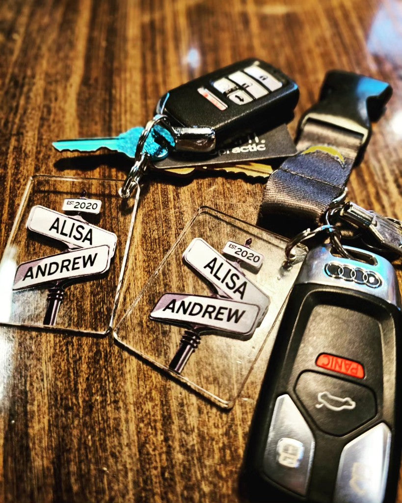 Customer photo of matching street sign keychains